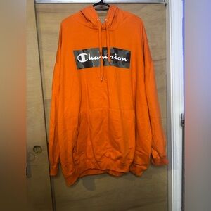 Champion Orange Hoodie with Camo Logo Panel